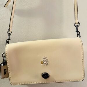 Coach Mickey Mouse Cross Body Bag, cream colored.